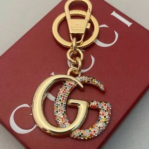 Gucci Gold Logo GG Bag Charm with Multicolor Crystals- dust bag and box included
